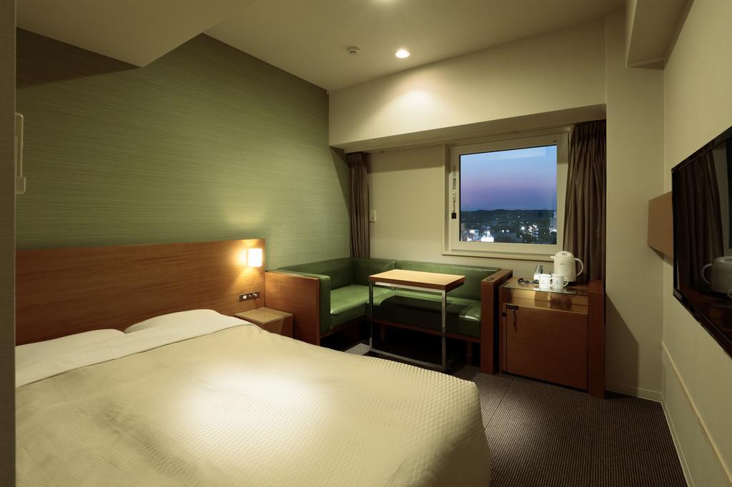 คันดิโอ้ โฮเทลส์ ฮันดะ Hotel ภายนอก รูปภาพ
