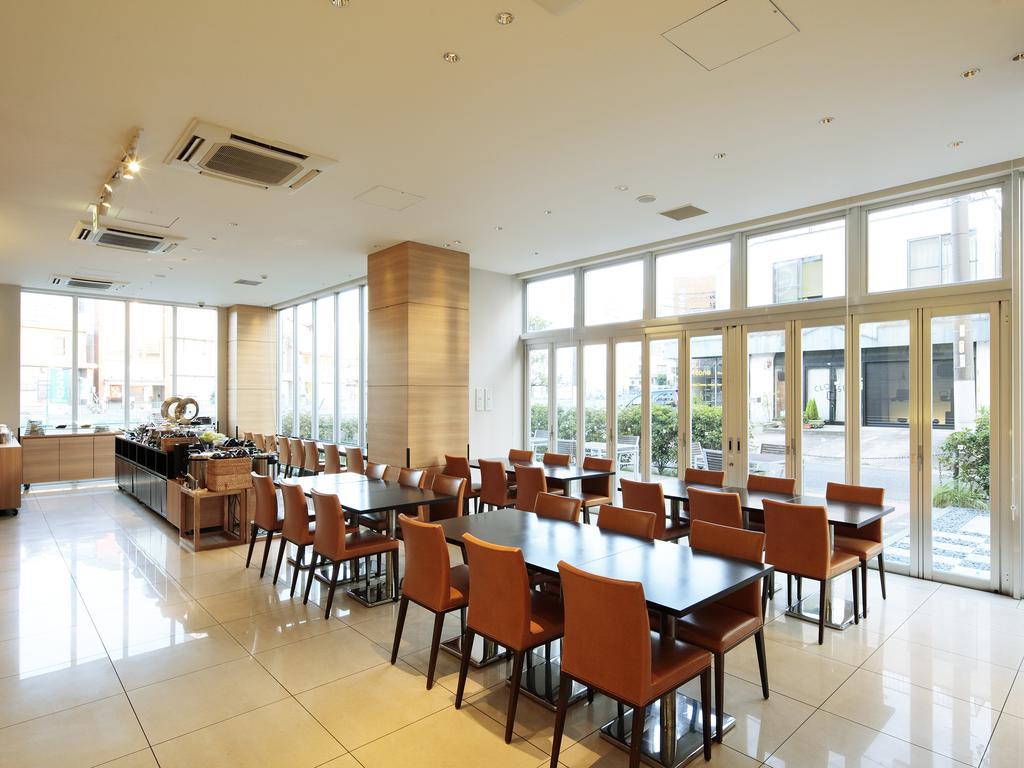 คันดิโอ้ โฮเทลส์ ฮันดะ Hotel ภายนอก รูปภาพ